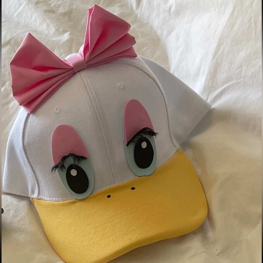 Daisy hat. Worn once on Halloween. From Etsy.